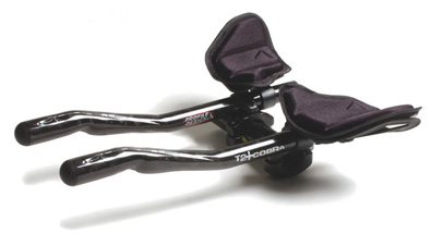 T2 + Cobra Opzetstuur 26.0-31.8 mm - Met perfecte ergonomie wordt met dit stuur gezorgt voor een perfecte aerodynamische houding. Ideaal voor tijdritten en triatlon. Past op zowel 26.0 als 31.8 mm sturen. Verkrijgbaar in de kleuren zwart en wit.