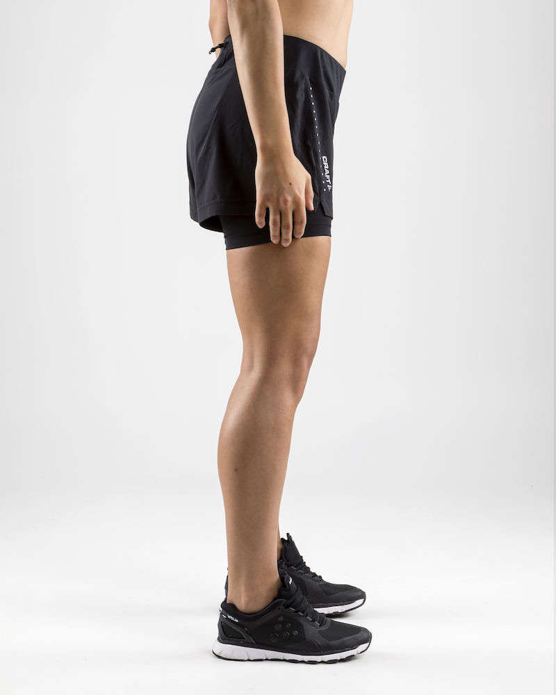 Craft Essential 2 IN 1 Hardloopbroek Kort Zwart Dames koop je bij